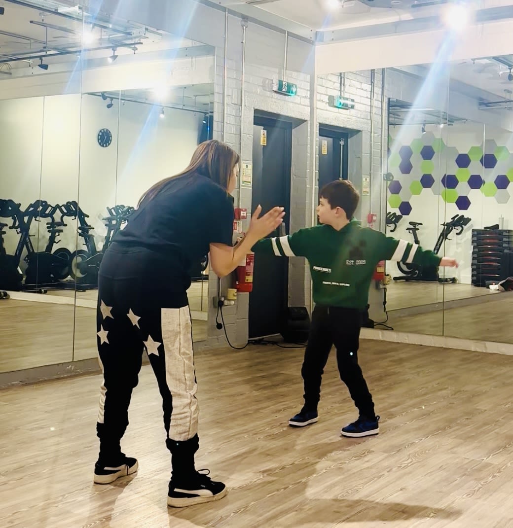 Vicki Stavrinos with student, Henry